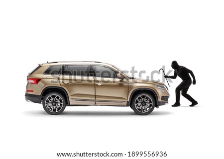 Burglar with a black mask and crowbar walking towards a SUV isolated on white background