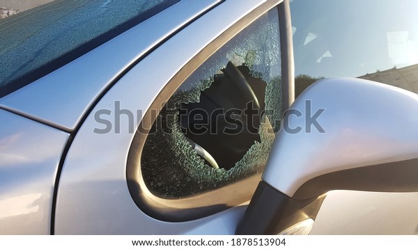 The burglar broke the side\
window of the car to steal. An example for insurance against\
robbery.