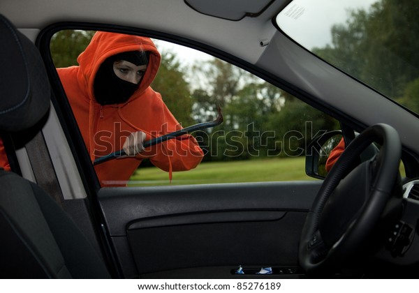 Burglar
wearing a mask (balaclava), car burglary,
series