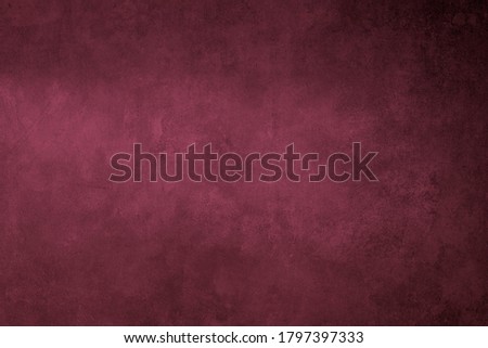 Burgundy colored grungy background or texture 