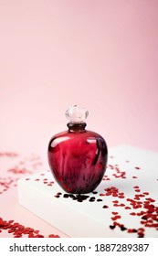 burgundy perfume bottle