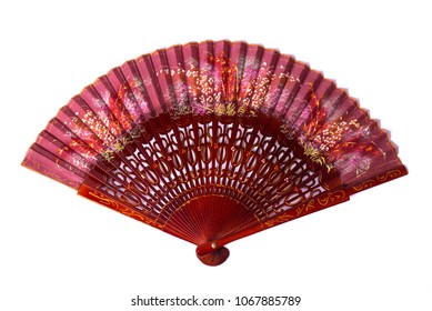 
burgundy spanish wooden hand fan with pattern, isolated