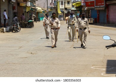 Burhanpur, Madhya Pradesh / India - April 11 2020: Covid 19 Corona Virus, Police Patrolling On The Streets Of Burhanpur During Nationwide Lockdown & Curfew. Burhanpur, Madhya Pradesh, India