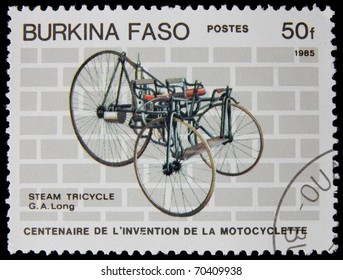 BURKINA FASO - CIRCA 1985: A stamp printed in the Burkina Faso showing steam tricycle circa 1985