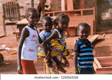 Burkina Faso, Ouagadougou - August 22, 2018: Young African Children On The Street