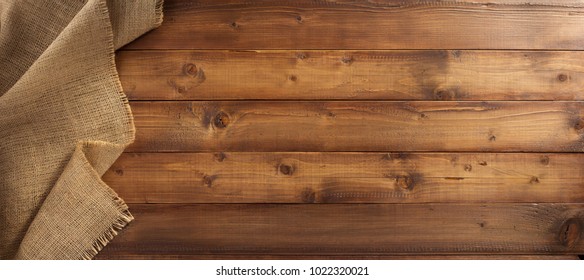burlap hessian sacking on wooden background