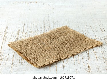 burlap napkin on old wooden table