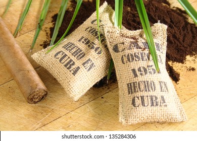 Burlap Sacks Of Cuban Coffee And A Cigar