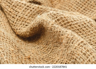 Burlap Texture. Burlap Fabric Background With Waves, Folds And Bruises