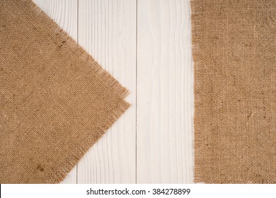 Burlap Texture On Wooden Table Background