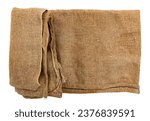 Burlap texture. A piece of torn burlap on a white background. Canvas. Packing material