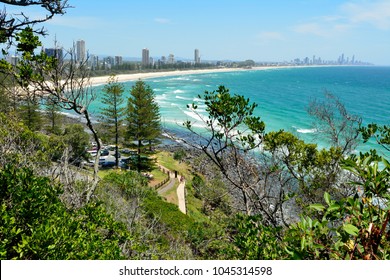 Burleigh Heads, Gold Coast, Queensland, Australia - January 13, 2018. View from Burleigh Heads National Park, toward Surfers Paradise, with buildings, cars, vegetation and people.