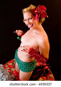 Burlesque performer shot in a studio setting.