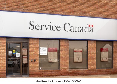 Burlington, Canada, April 12, 2021; A Red Brick Service Canada Federal Government Services Walk In Office In A Strip Mall