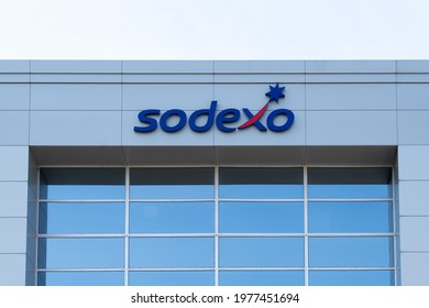 Burlington, Ontario, Canada - May 15, 2021: Close Up Of Sodexo Sign On The Building, Burlington, Ontario, Canada. Sodexo Is A French Food Services And Facilities Management Company.  