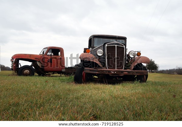 BURLINGTON, VERMONT - November 26, 2016: Old rusted\
trucks along VT-22A in  Orwell, VT. Editorial use only.            \
                   