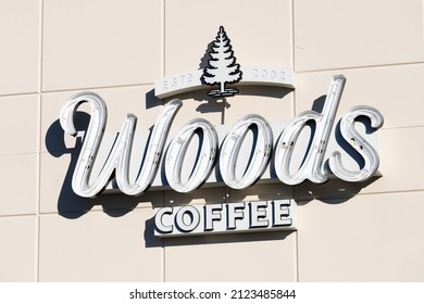 Burlington, WA, USA - February 12, 2022; Woods Coffee Sign With Logo Of The Pacific Northwest Chain Of Coffee Shops