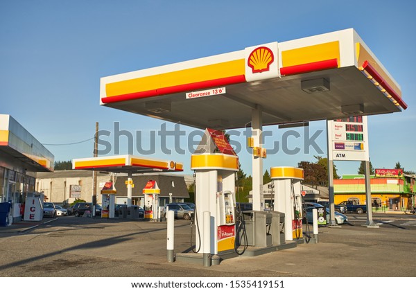 Burlington, WA, USA - Oct 11, 2019: A Shell gas\
station. Royal Dutch Shell PLC, commonly known as Shell, is a\
British-Dutch oil and gas company headquartered in the Netherlands\
and incorporated in\
UK.