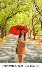 A Burmese Model In Traditional Dress