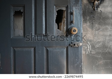 burn dirty wood door texture background and broken glass