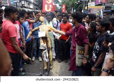 StudentÃ¢Â?Â?s Burn Effigy Of Education Minister In A Rally Which Protest Against On Assault Calcutta University Faculty Member By T.M.C. Student Wing On July 02, 2015 In Calcutta, India. 