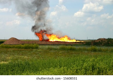 Burn out of oil well in steppe.