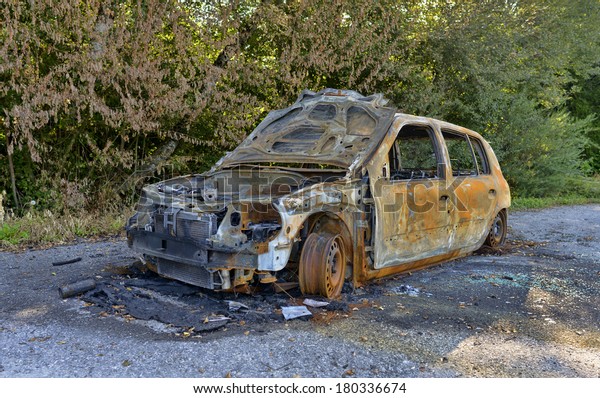 burned car on a\
parking