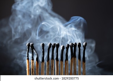 Burned, extinguished matches isolated on black background, clipping path