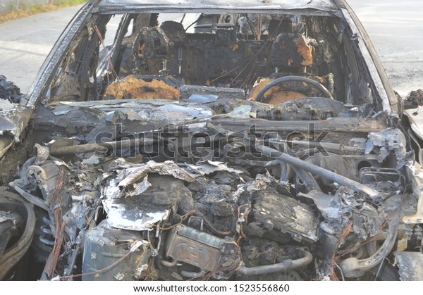 Burned out car after\
fire