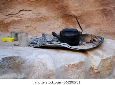 Burned Tea Kettle, Glass, And Other Utensils Of A Nomadic Cave Dweller, Bedouin In Petra Jordan Antique City Featured In Indiana Jones