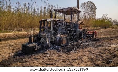 burned tractor inside out