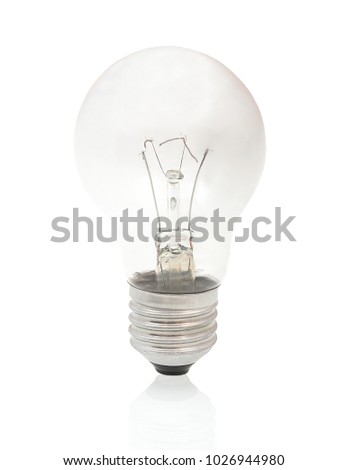 Burned-out light bulb isolated on white background with shadow reflection. Burned light bulb on white backdrop. Burned incandescent light bulb.
