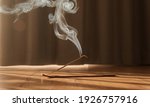 Burning aromatic incense smoky stick for meditation and relaxing. Aromatherapy smoke for yoga concept.