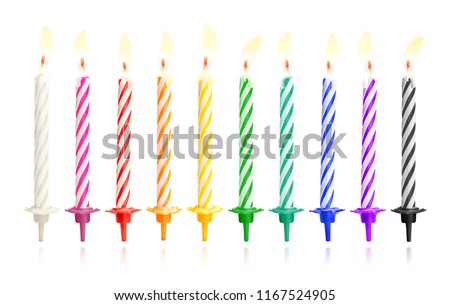 Burning birthday candles isolated on dark background with fire flames. Colorful collection. ( Clipping path )