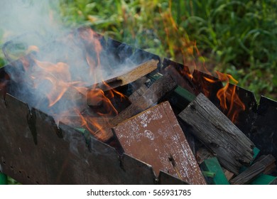 Burning board in brazier