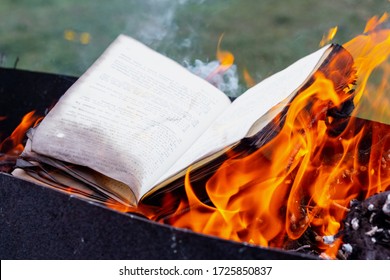 Burning books. The book is burning on an open fire
