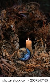 Burning Candle, Symbol Of Moon, Dry Autumn Leaves On Dark Natural Background. Old Pagan, Wiccan, Slavic Traditions. Witchcraft, Esoteric Spiritual Ritual For Mabon, Halloween, Samhain Sabbath