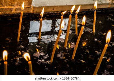 Burning Candles For Dead Or Alive People At Orthodox Or Catholics.