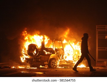 burning car, unrest, anti-government, crime - Shutterstock ID 581564755