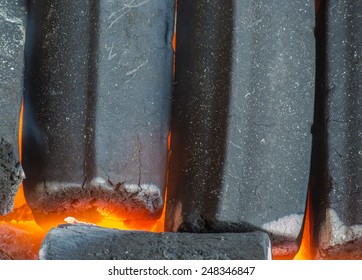 Burning charcoal grill
