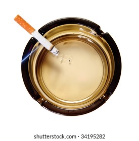 Burning Cigarette In Ash Tray. Top View. Isolated