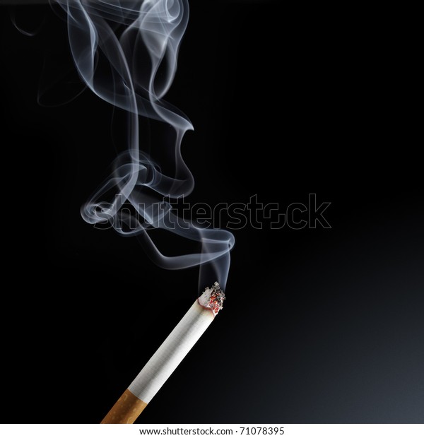 Burning Cigarette Smoke On Black Background Stock Photo (Edit Now) 71078395