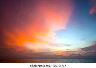 Burning Clouds And Tropical Sea After The Sun Is Set