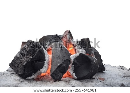 Burning coal fire, white Background of the hot charcoal, Close up of stacked burning black charcoals with fire and flame, Hazro Attock 