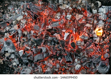 Burning coals texture of bonfire abstract background.
