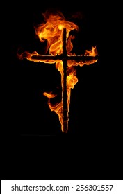 burning cross in black background