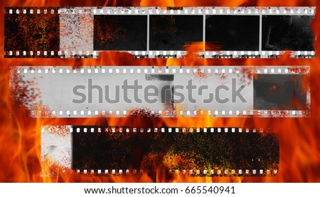 Burning dirty and damaged strip of celluloid films