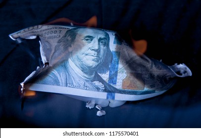 Burning Dollar Bill As A Symbol Of Global Financial Crisis