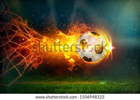 Burning Fiery Soccer Ball In Goal With Net In Flames