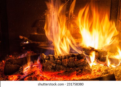 Burning Firewood In The Fireplace Close Up